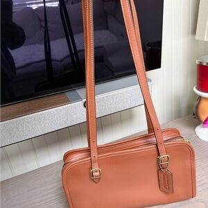 Coach Saddle Swing Zip